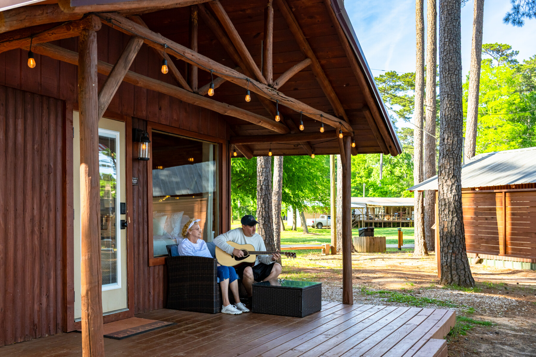 jbp highres mlc 11 couple on porch in mid lake campground on toledo bend at hemphill tx